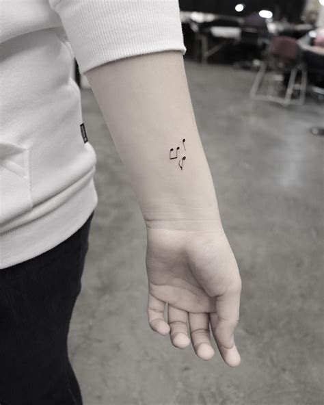 music note finger tattoo|small music tattoos for females.